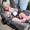 Baby in carrier with bottle attached to Pewter Busy Baby Bottle Bungee