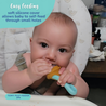 A baby sitting in a highchair eating from the TOMY brand pulp feeder