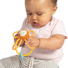 baby playing with Toy Winkel Monkey Rattle & Sensory Teether